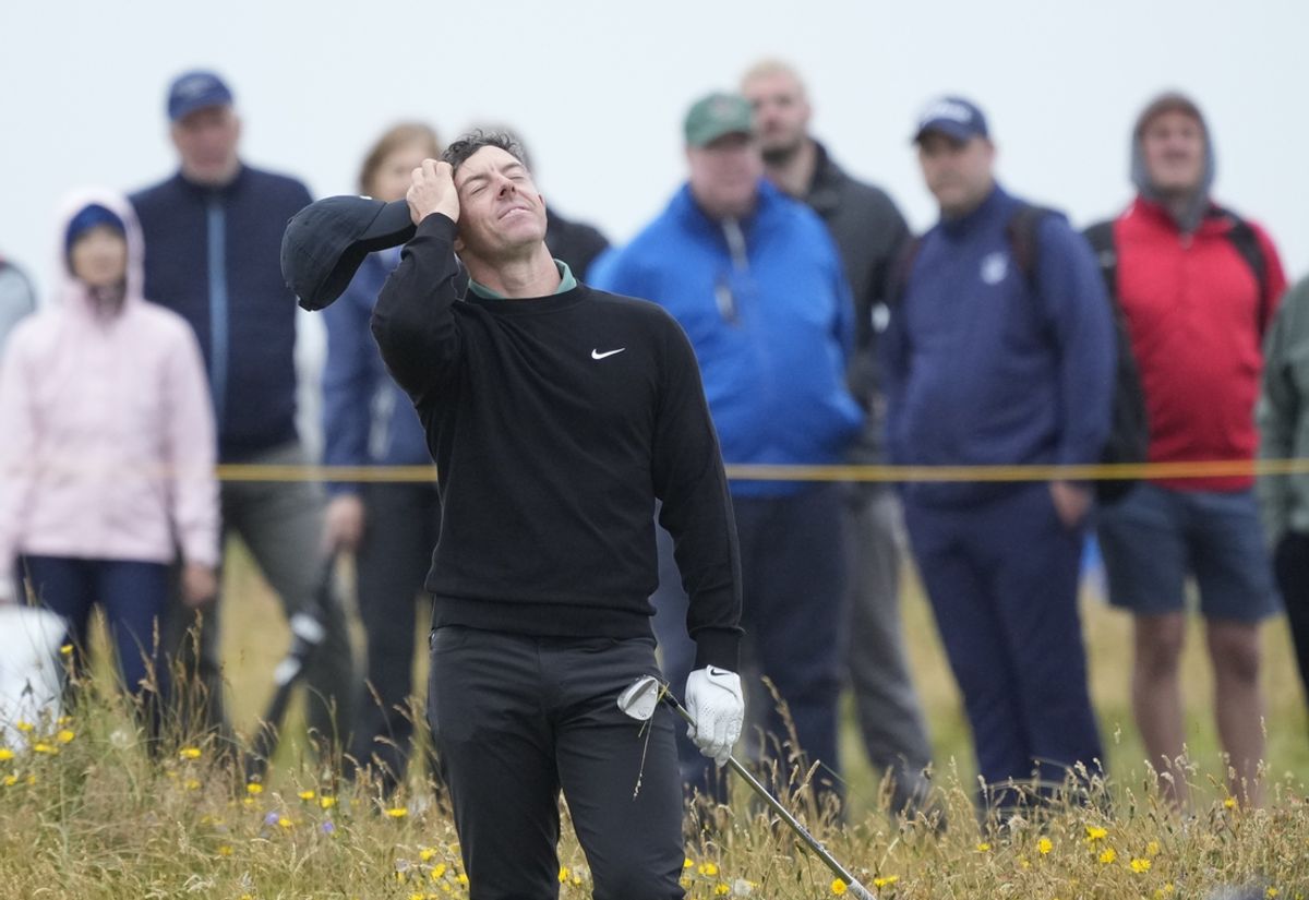 Jul 18, 2024; Ayrshire, SCT; Rory McIlroy reacts after hitting from the rough on the 15th hole during the first round of the Open Championship golf tournament at Royal Troon. Mandatory Credit: Jack Gruber-USA TODAY Sports