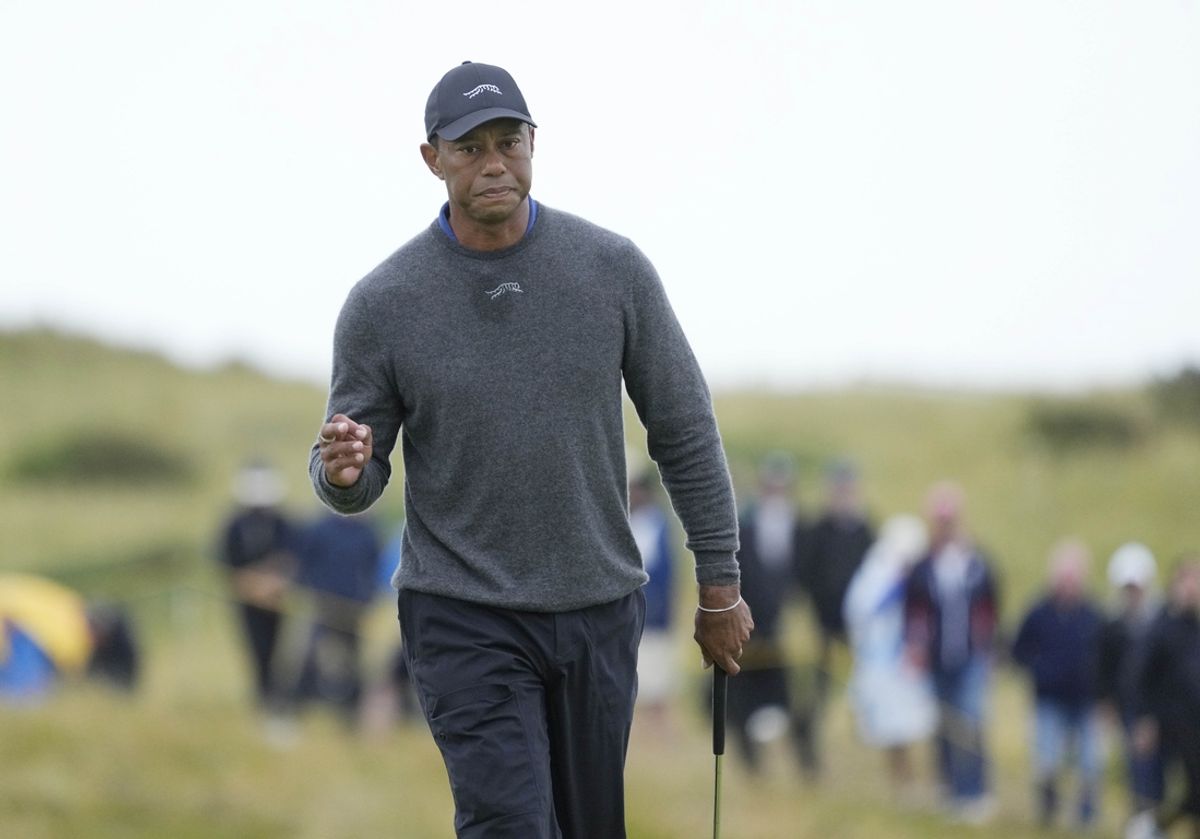 Jul 18, 2024; Ayrshire, SCT; Tiger Woods reacts after putting on the 13th green during the first round of the Open Championship golf tournament at Royal Troon. Mandatory Credit: Jack Gruber-Imagn Images