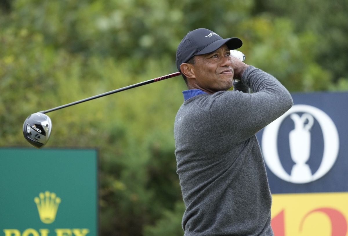 Jul 18, 2024; Ayrshire, SCT; Tiger Woods hits his tee shot on the 12th hole during the first round of the Open Championship golf tournament at Royal Troon. Mandatory Credit: Jack Gruber-USA TODAY Sports