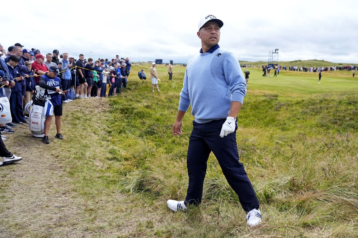 Jul 19, 2024; Ayrshire, SCT; Xander Schauffele lines up his shot on the 13th hole during the second round of the Open Championship golf tournament at Royal Troon. Mandatory Credit: Jack Gruber-USA TODAY Sports