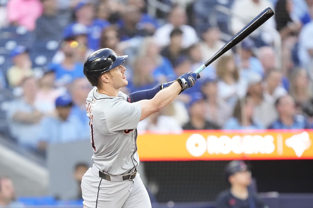 Jul 19, 2024; Toronto, Ontario, CAN; Detroit Tigers designated hitter Mark Canha (21) hits a two run home run against the Toronto Blue Jays during the fourth inning at Rogers Centre. Mandatory Credit: John E. Sokolowski-USA TODAY Sports