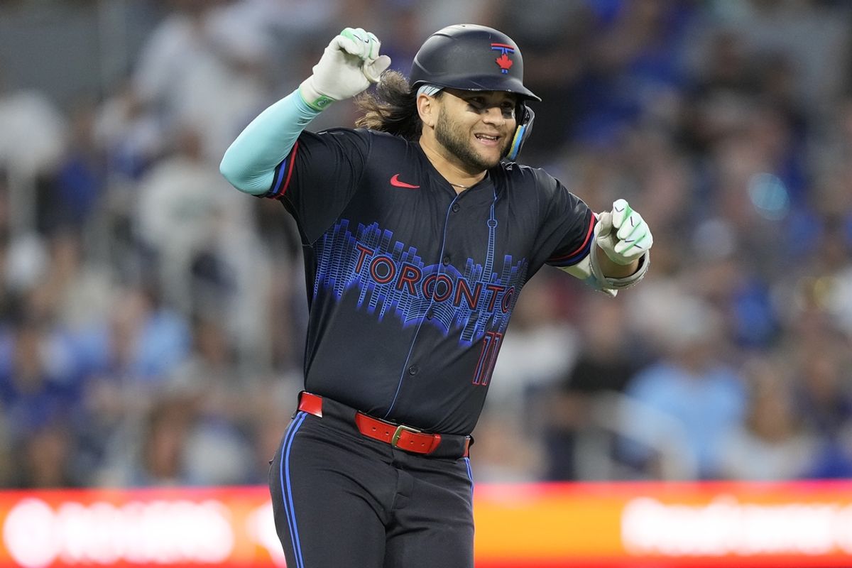 Jul 19, 2024; Toronto, Ontario, CAN; Toronto Blue Jays shortstop Bo Bichette (11) reacts as he suffers a lower body injury as he runs to first base during the sixth inning against the Detroit Tigers at Rogers Centre. Mandatory Credit: John E. Sokolowski-USA TODAY Sports