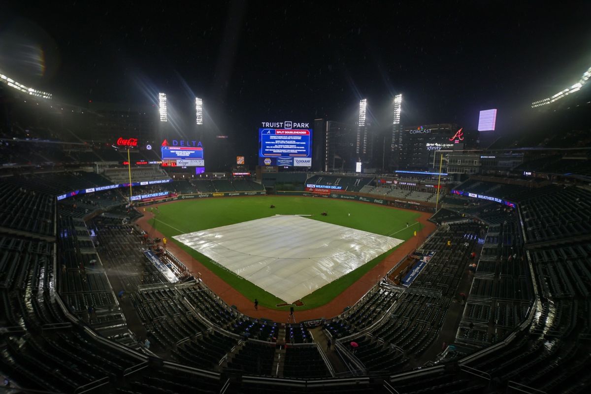 Jul 19, 2024; Atlanta, Georgia, USA; A view of the tarp on the field at Truist Park after a game between the Atlanta Braves and St. Louis Cardinals was canceled due to weather. Mandatory Credit: Brett Davis-USA TODAY Sports