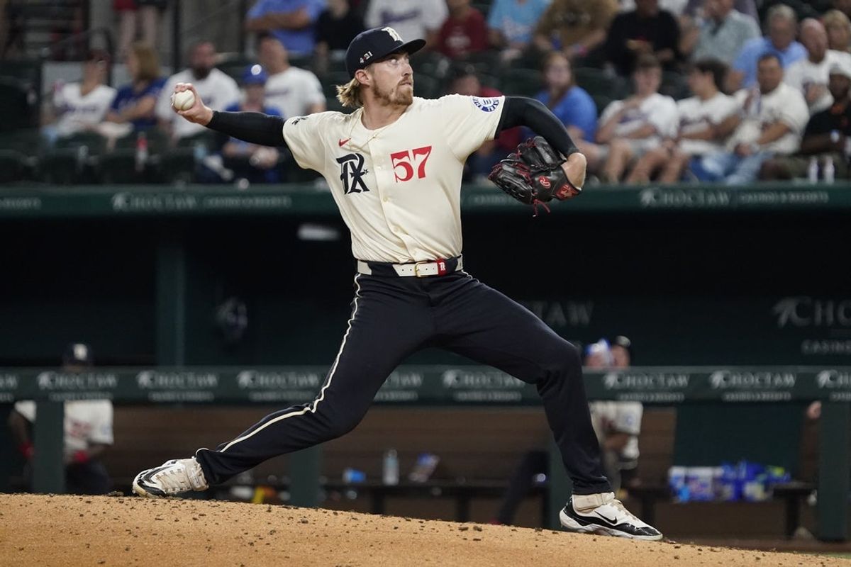 Jul 19, 2024; Arlington, Texas, USA; Texas Rangers pitcher Daniel Robert (57) throws to the plate during the eighth inning against the Baltimore Orioles at Globe Life Field. Mandatory Credit: Raymond Carlin III-Imagn Images