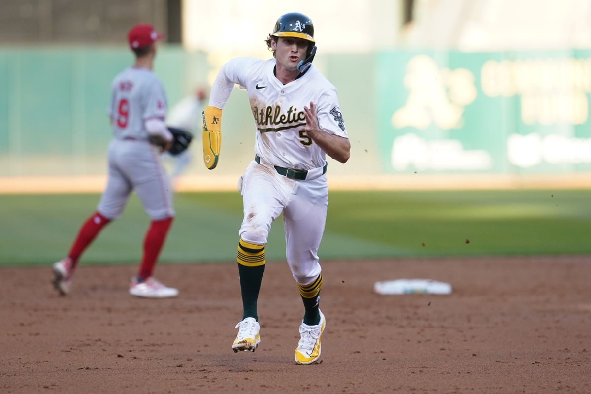 Jul 19, 2024; Oakland, California, USA; Oakland Athletics shortstop Jacob Wilson (5) runs toward third base before scoring a run against the Los Angeles Angels in the third inning at Oakland-Alameda County Coliseum. Mandatory Credit: Cary Edmondson-USA TODAY Sports