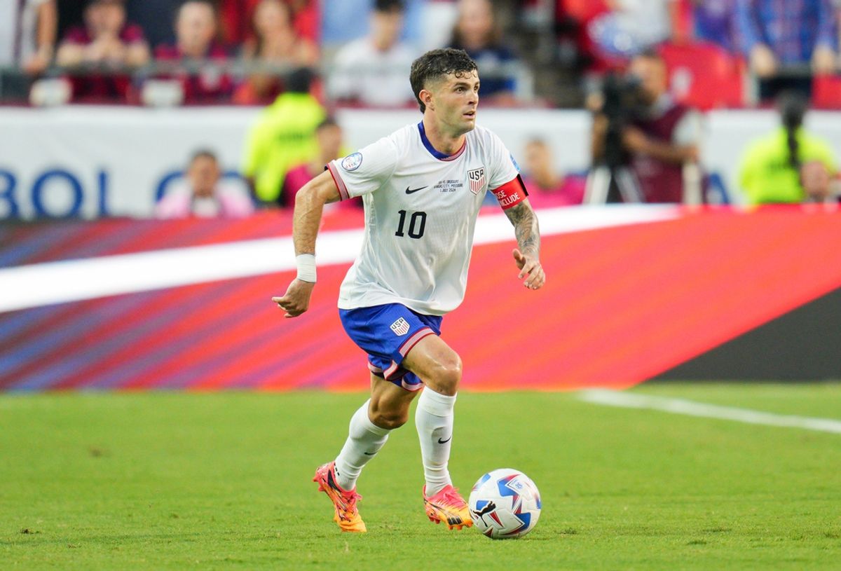 Jul 1, 2024; Kansas City, Missouri, USA; United States forward Christian Pulisic (10) controls the ball during the first half of a Copa America match against Uruguay at Arrowhead Stadium. Mandatory Credit: Jay Biggerstaff-USA TODAY Sports