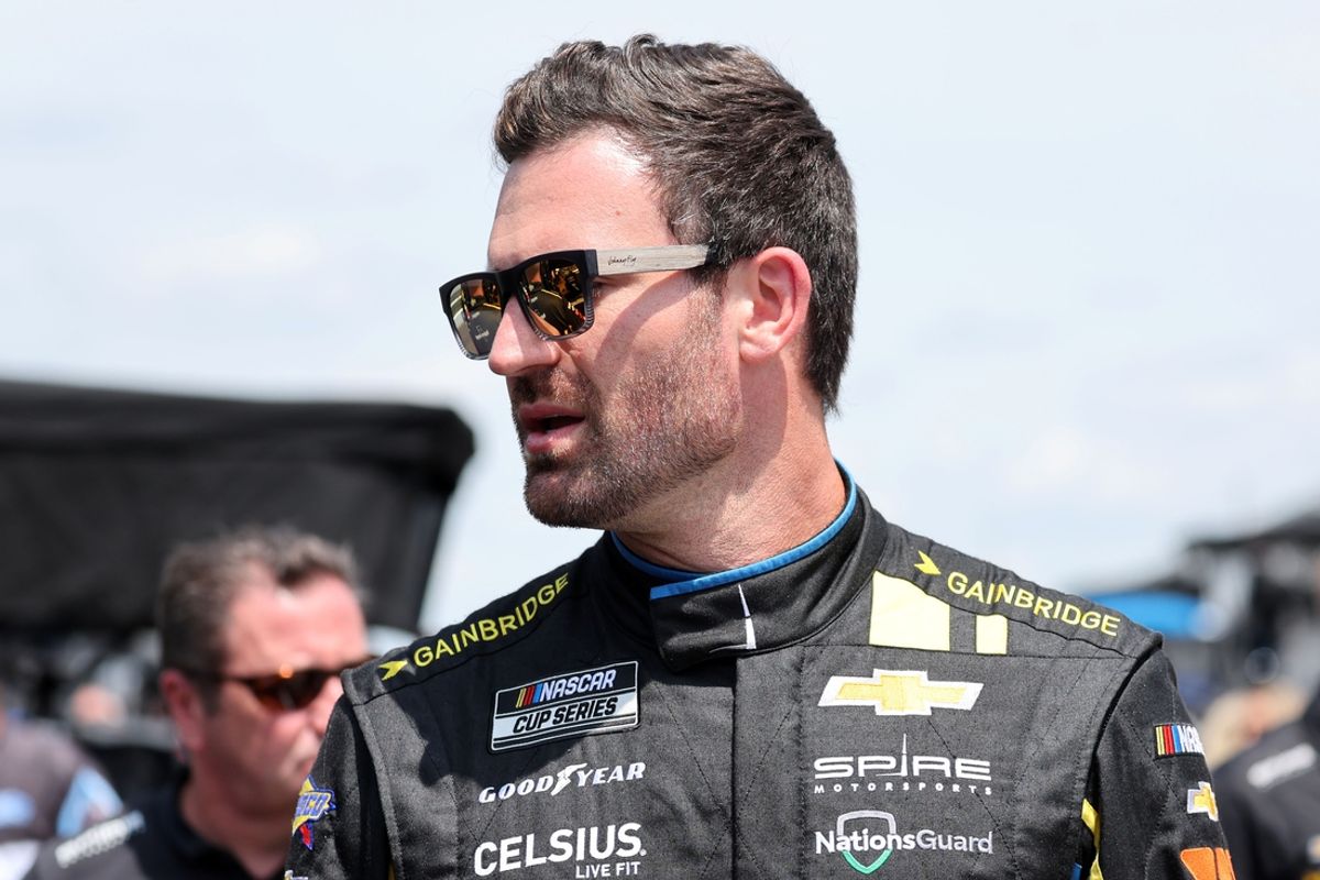 Jul 20, 2024; Indianapolis, Indiana, USA; NASCAR Cup Series driver Corey LaJoie (7) during qualifying for the Brickyard 400 at Indianapolis Motor Speedway. Mandatory Credit: Mike Dinovo-USA TODAY Sports