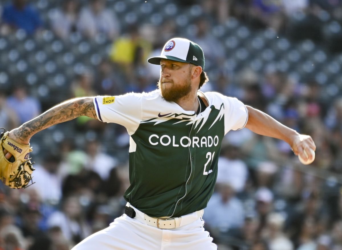 Jul 20, 2024; Denver, Colorado, USA; Colorado Rockies pitcher Kyle Freeland (21) delivers against the San Francisco Giants in the first inning at Coors Field. Mandatory Credit: John Leyba-USA TODAY Sports