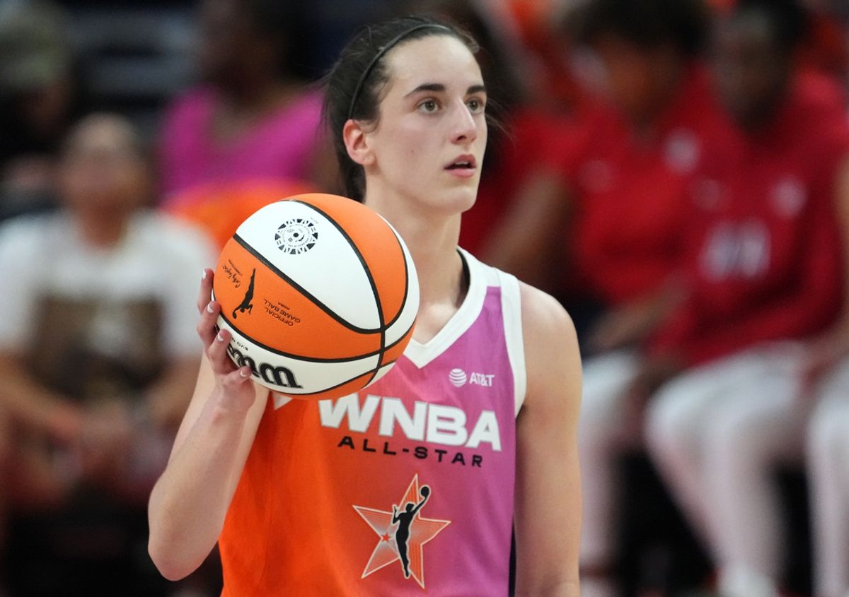 Jul 20, 2024; Phoenix, AZ, USA; Team WNBA guard Caitlin Clark (22) dribbles against USA Women's National Team during the WNBA All Star Game at Footprint Center. Mandatory Credit: Joe Camporeale-Imagn Images