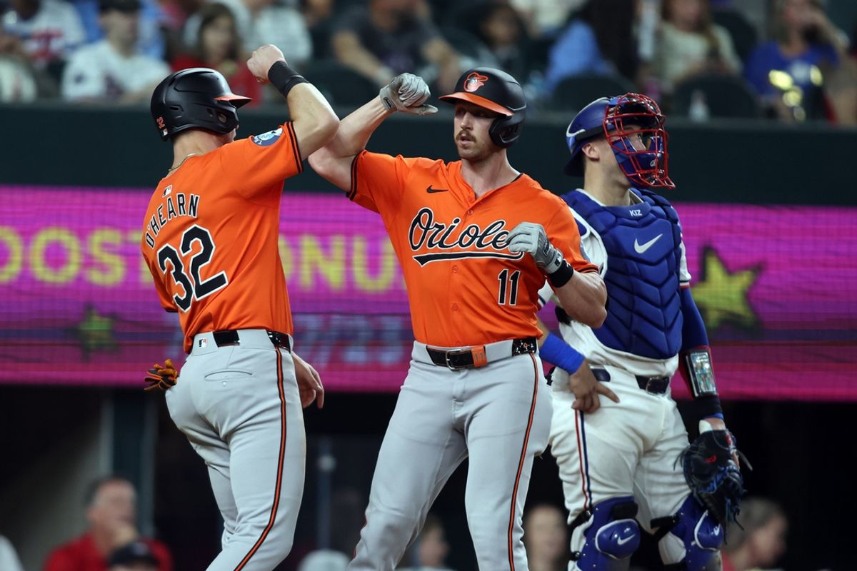 Jul 20, 2024; Arlington, Texas, USA; Baltimore Orioles second base Jordan Westburg (11) celebrates with first base Ryan O'Hearn (32) after hitting a two run home run against the Texas Rangers in the sixth inning at Globe Life Field. Mandatory Credit: Tim Heitman-USA TODAY Sports