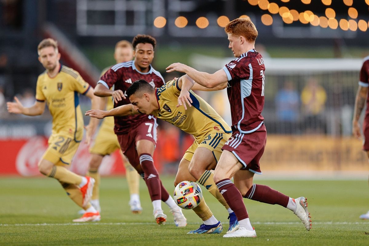 Jul 20, 2024; Commerce City, Colorado, USA; Real Salt Lake midfielder Braian Ojeda (6) and Colorado Rapids midfielder Oliver Larraz (18) battle for the ball in the first half at Dick's Sporting Goods Park. Mandatory Credit: Isaiah J. Downing-USA TODAY Sports