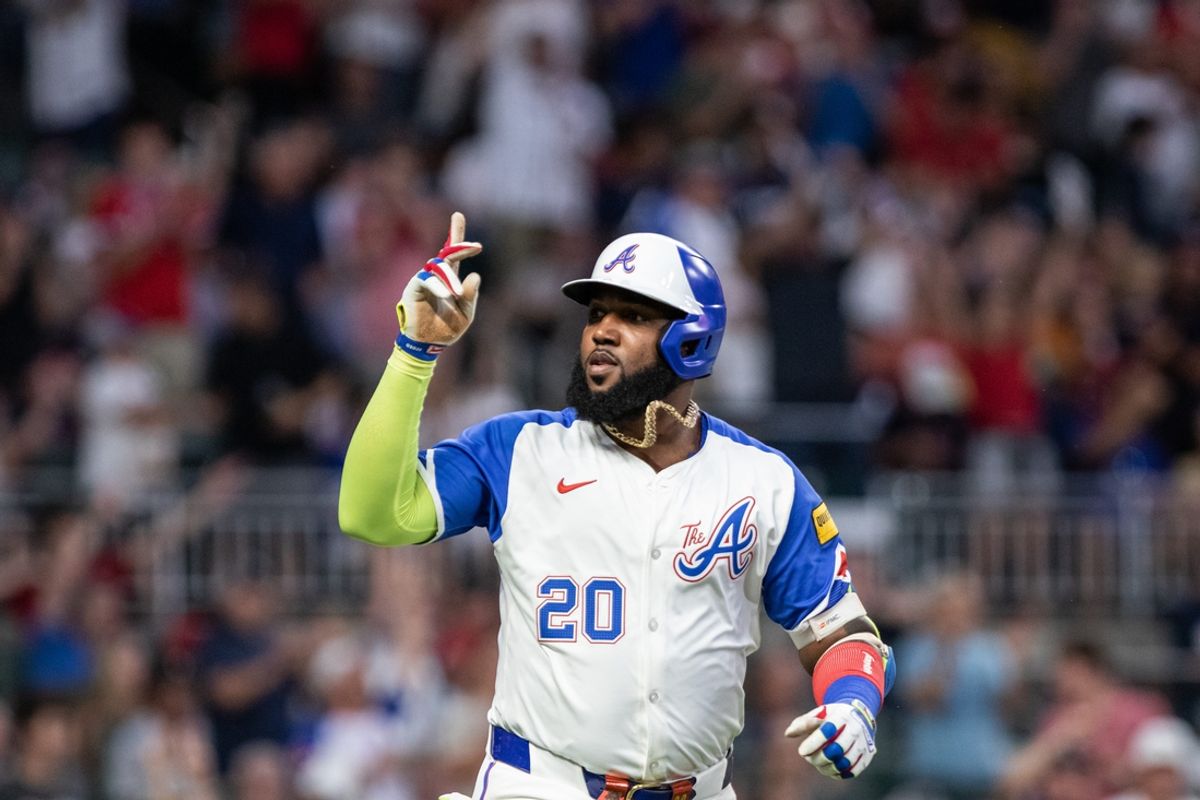 Jul 20, 2024; Cumberland, Georgia, USA; Atlanta Braves designated hitter Marcell Ozuna (20) reacts after hitting home-run against the St. Louis Cardinals during the sixth inning at Truist Park. Mandatory Credit: Jordan Godfree-USA TODAY Sports