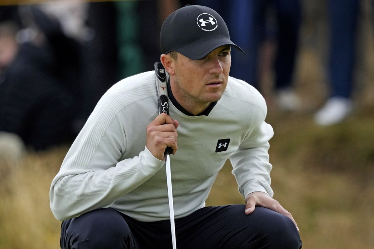 Jul 21, 2024; Ayrshire, SCT; Jordan Spieth lines up his putt on the 12th green during the final round of the Open Championship golf tournament at Royal Troon. Mandatory Credit: Jack Gruber-USA TODAY Sports