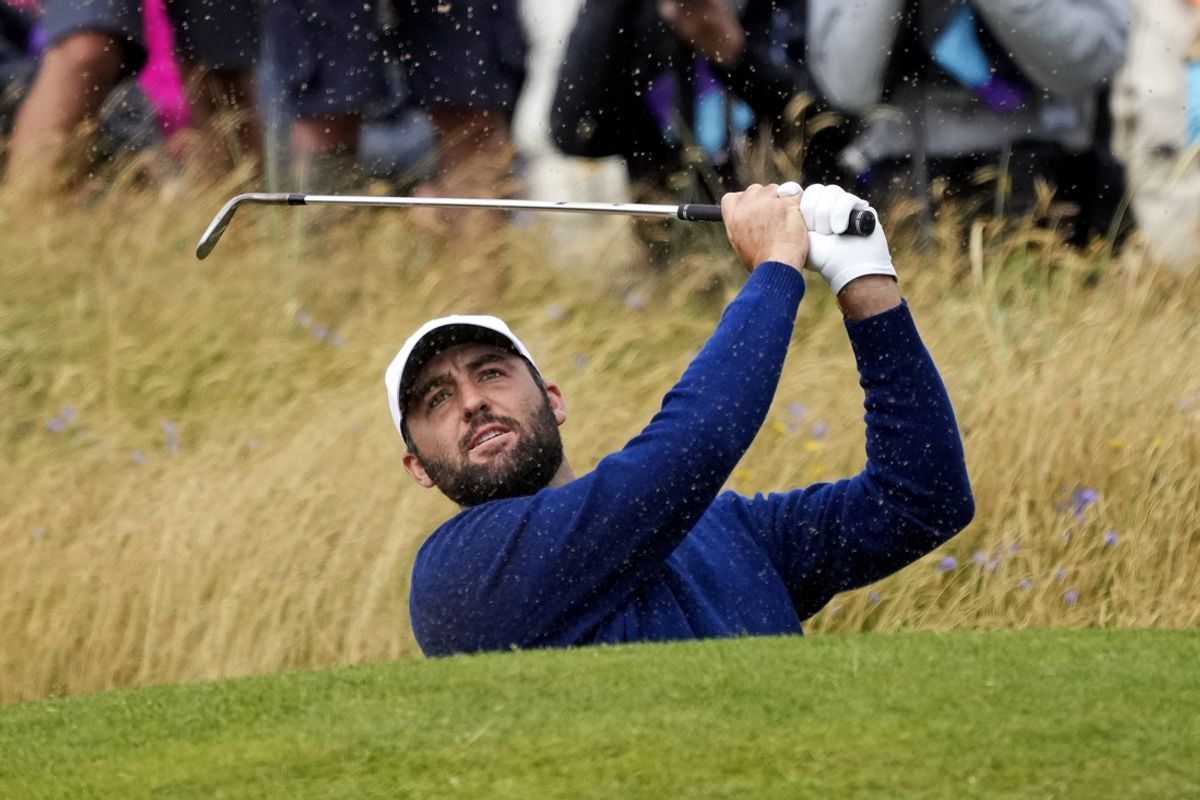 Jul 21, 2024; Ayrshire, SCT; Scottie Scheffler plays a shot from a bunker on the fourth hole during the final round of the Open Championship golf tournament at Royal Troon. Mandatory Credit: Jack Gruber-USA TODAY Sports