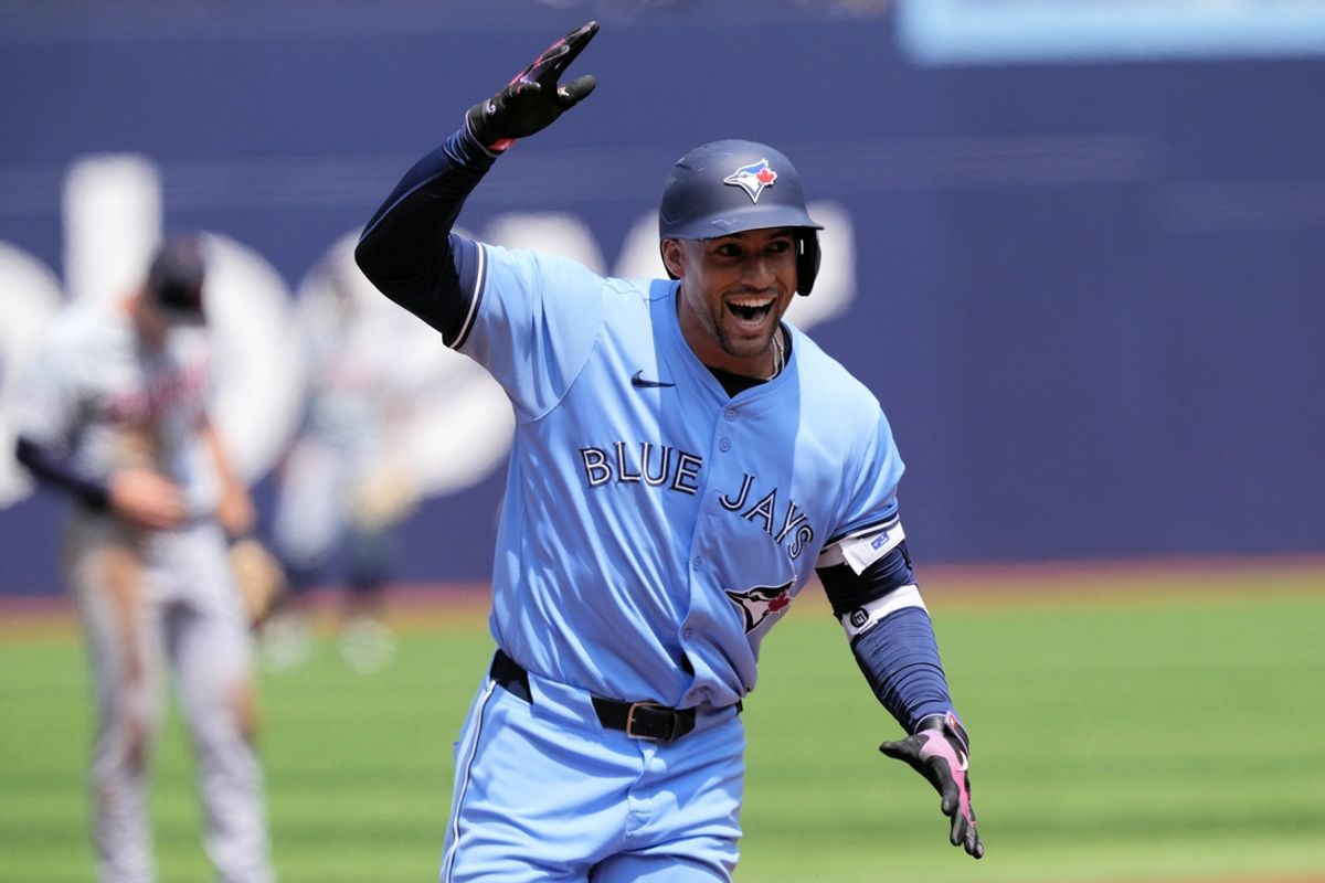 Jul 21, 2024; Toronto, Ontario, CAN; Toronto Blue Jays right fielder George Springer (4) celebrates his solo home run against the Detroit Tigers as he runs the bases during the first inning at Rogers Centre. Mandatory Credit: John E. Sokolowski-USA TODAY Sports