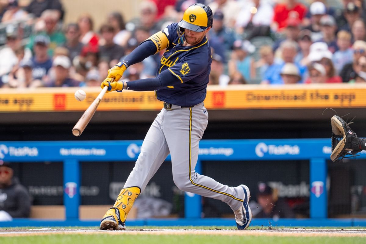 Jul 21, 2024; Minneapolis, Minnesota, USA; Milwaukee Brewers second base Brice Turang (2) leads off with a fly out to Minnesota Twins right field Max Kepler (26) in the first inning at Target Field. Mandatory Credit: Matt Blewett-USA TODAY Sports