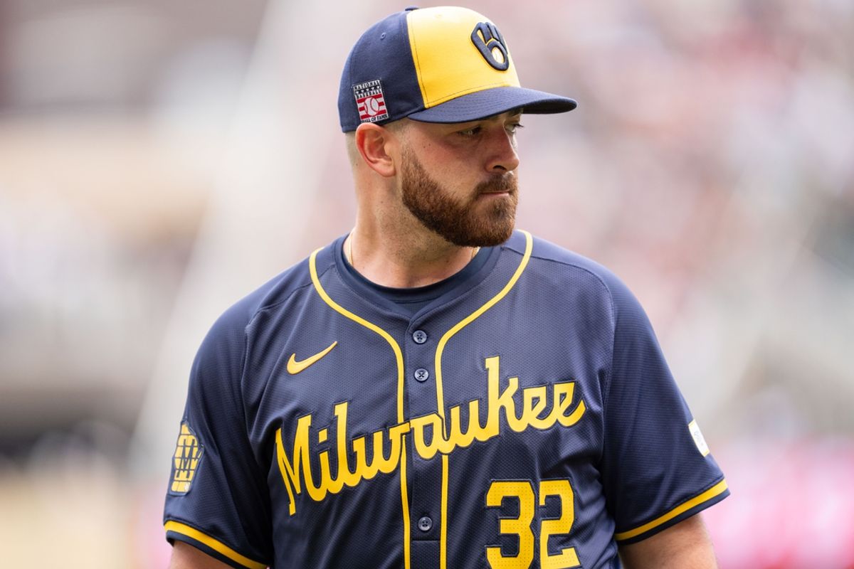 Jul 21, 2024; Minneapolis, Minnesota, USA; Milwaukee Brewers pitcher Aaron Civale (32) walks to the dugout after the fourth inning against the Minnesota Twins at Target Field. Mandatory Credit: Matt Blewett-USA TODAY Sports