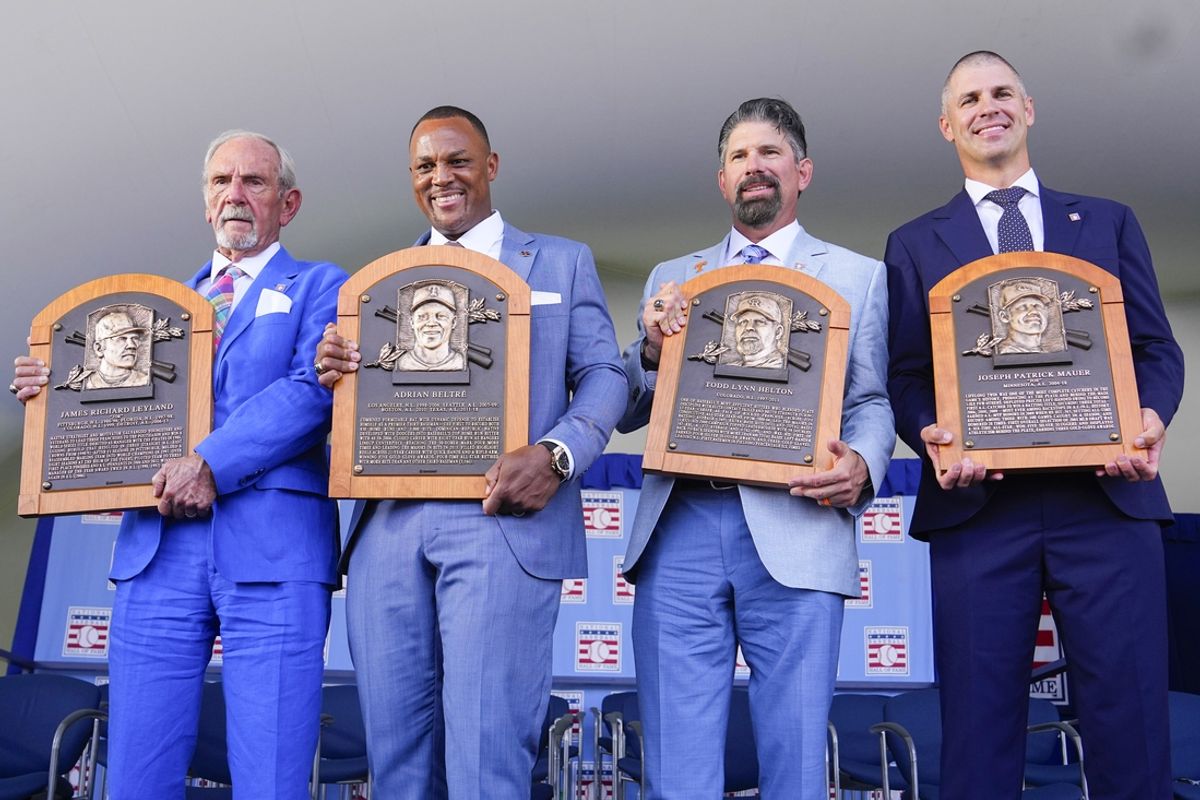 Jul 21, 2024; Cooperstown, New York, USA; Hall of Fame Inductee Jim Leyland, Hall of Fame Inductee Adrian Beltre, Hall of Fame Inductee Todd Helton and Hall of Fame Inductee Joe Mauer pose with their Baseball Hall of Fame plaques during the National Baseball Hall of Fame Induction Ceremony in Cooperstown, NY. Mandatory Credit: Gregory Fisher-USA TODAY Sports