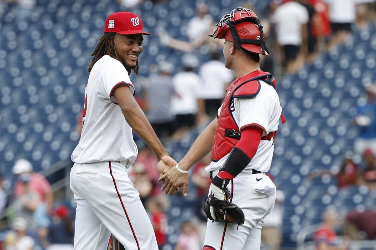 Jul 21, 2024; Washington, District of Columbia, USA; Washington Nationals outfielder James Wood (29) celebrates with Washington Nationals catcher Riley Adams (15) after their game against the Cincinnati Reds at Nationals Park. Mandatory Credit: Geoff Burke-USA TODAY Sports