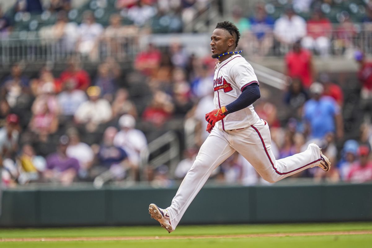 Jul 21, 2024; Cumberland, Georgia, USA; Atlanta Braves second baseman Ozzie Albies (1) runs after hitting a double against the St. Louis Cardinals during the eighth inning at Truist Park. Mandatory Credit: Dale Zanine-Imagn Images