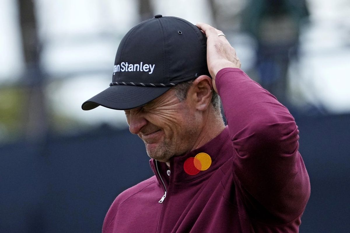 Jul 21, 2024; Ayrshire, SCT; Justin Rose reacts on the 18th green during the final round of the Open Championship golf tournament at Royal Troon. Mandatory Credit: Jack Gruber-Imagn Images