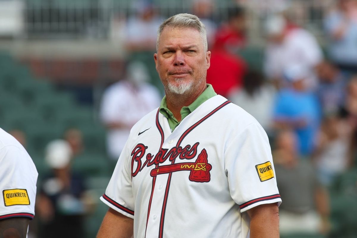 Jul 22, 2024; Atlanta, Georgia, USA; Former Atlanta Braves third baseman Chipper Jones (10) on the field before a game against the Cincinnati Reds at Truist Park. Mandatory Credit: Brett Davis-Imagn Images