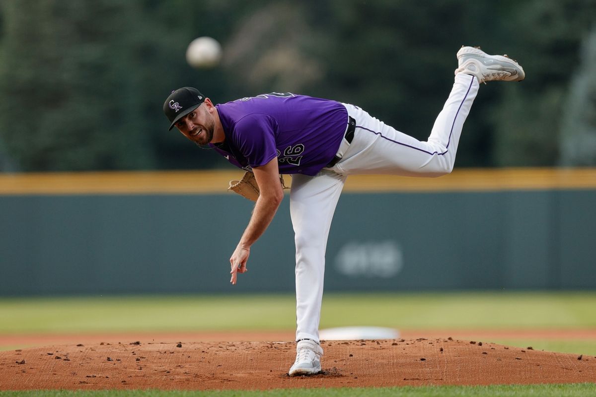 Jul 22, 2024; Denver, Colorado, USA; Colorado Rockies starting pitcher Austin Gomber (26) pitches in the first inning against the Boston Red Sox at Coors Field. Mandatory Credit: Isaiah J. Downing-USA TODAY Sports