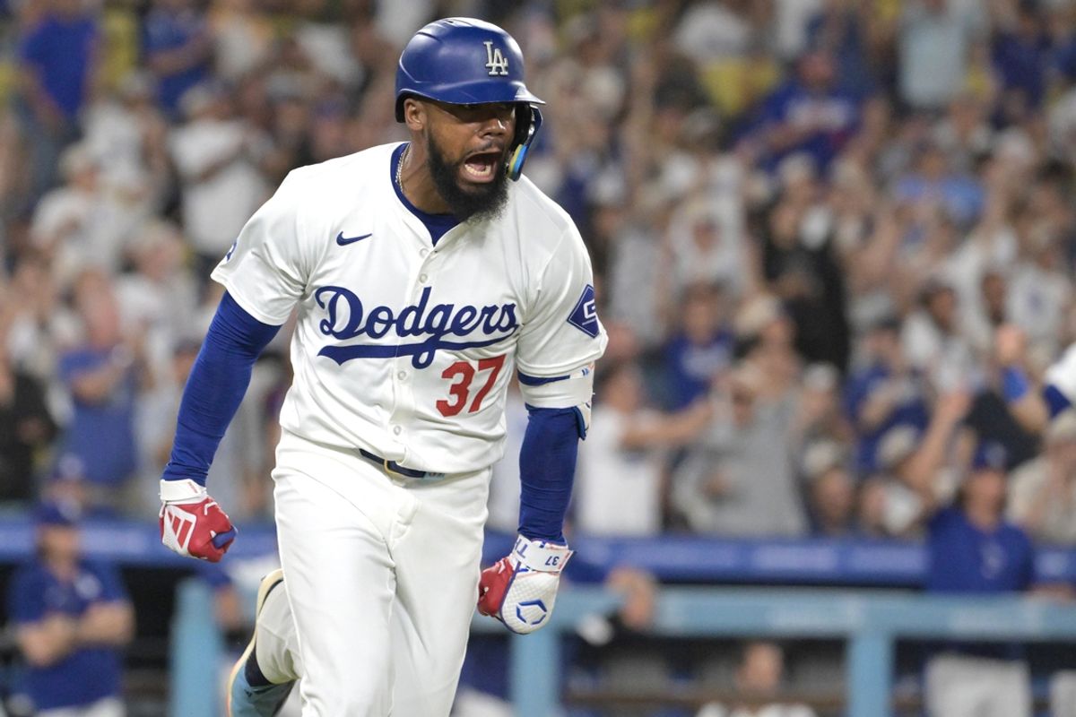 Jul 22, 2024; Los Angeles, California, USA; Los Angeles Dodgers left fielder Teoscar Hernandez (37) celebrates after hitting a RBI single in the eighth inning against the San Francisco Giants at Dodger Stadium. Mandatory Credit: Jayne Kamin-Oncea-USA TODAY Sports