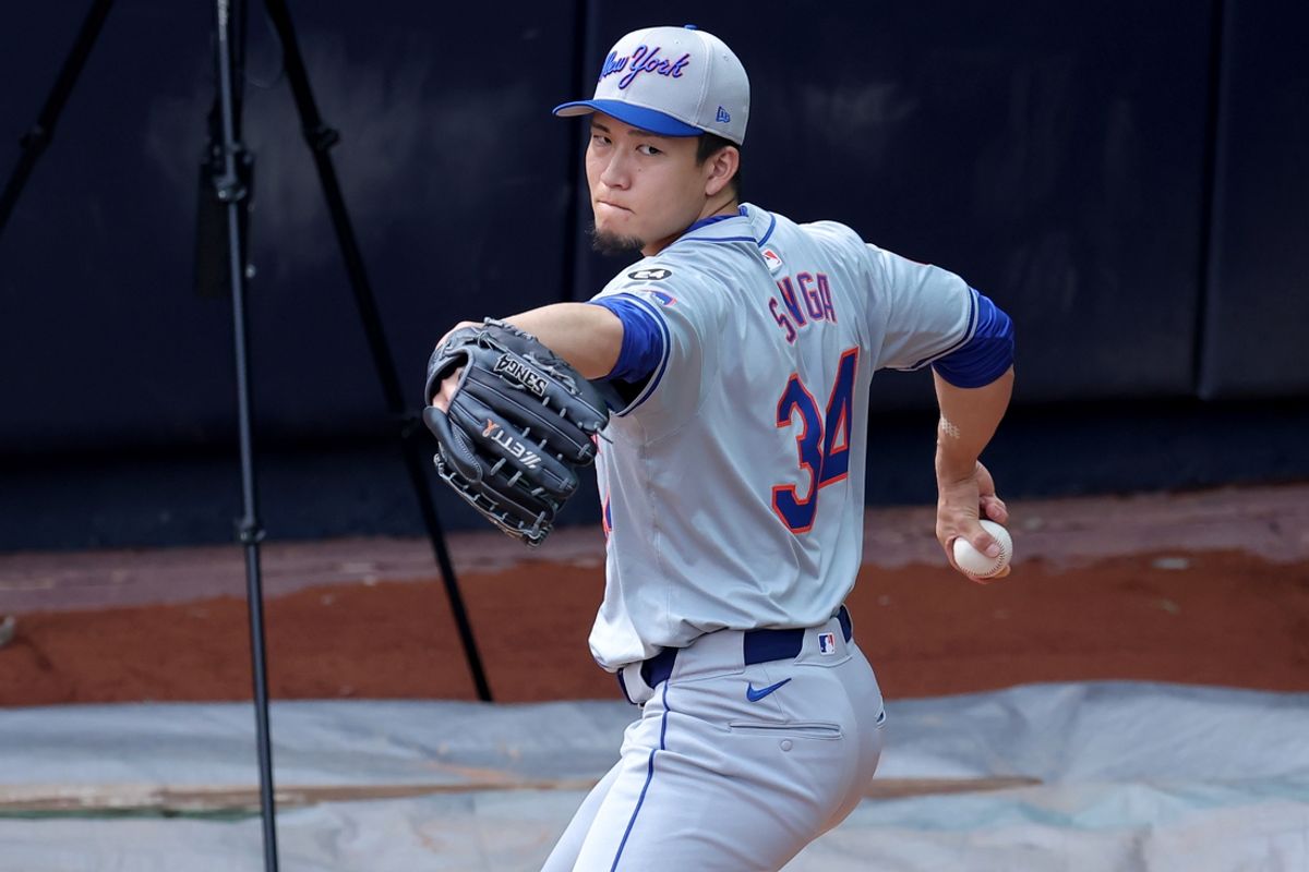 Jul 23, 2024; Bronx, New York, USA; New York Mets injured starting pitcher Kodai Senga (34) works out in the bullpen at Yankee Stadium before a game against the New York Yankees. Mandatory Credit: Brad Penner-USA TODAY Sports