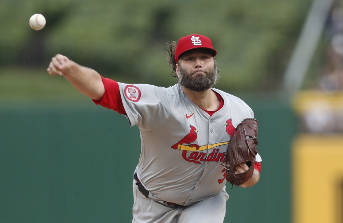 Jul 23, 2024; Pittsburgh, Pennsylvania, USA; St. Louis Cardinals starting pitcher Lance Lynn (31) delivers a pitch against the Pittsburgh Pirates during the first inning at PNC Park. Mandatory Credit: Charles LeClaire-Imagn Images