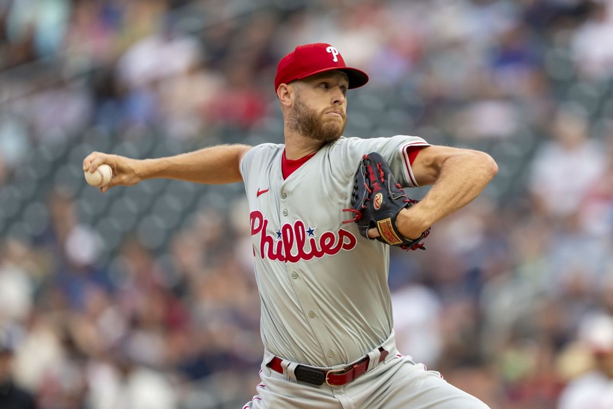 Jul 23, 2024; Minneapolis, Minnesota, USA; Philadelphia Phillies starting pitcher Zack Wheeler (45) delivers a pitch against the Minnesota Twins in the first inning at Target Field. Mandatory Credit: Jesse Johnson-USA TODAY Sports