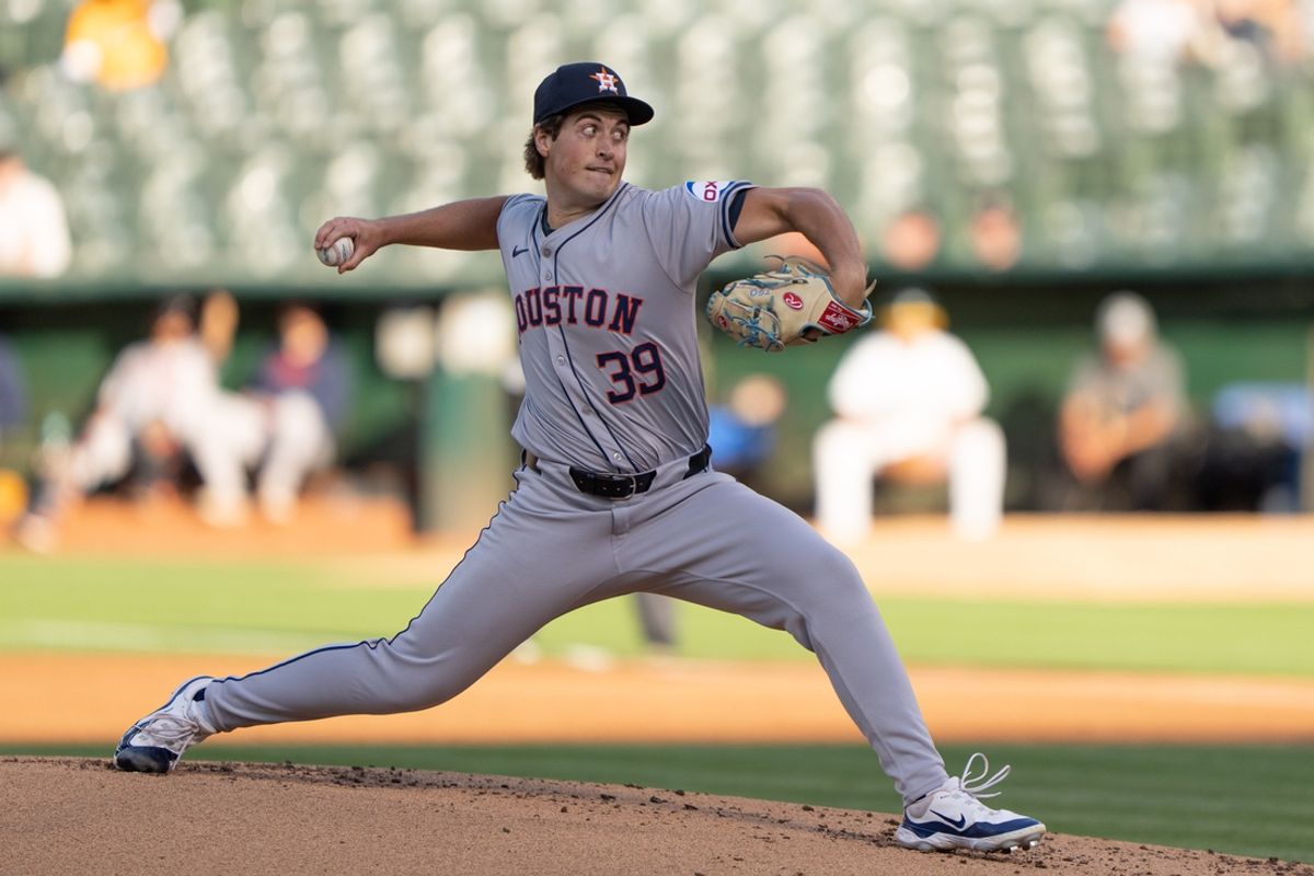 Jul 23, 2024; Oakland, California, USA;  Houston Astros pitcher Jake Bloss (39) throws during the first inning against the Oakland Athletics at Oakland-Alameda County Coliseum. Mandatory Credit: Stan Szeto-USA TODAY Sports