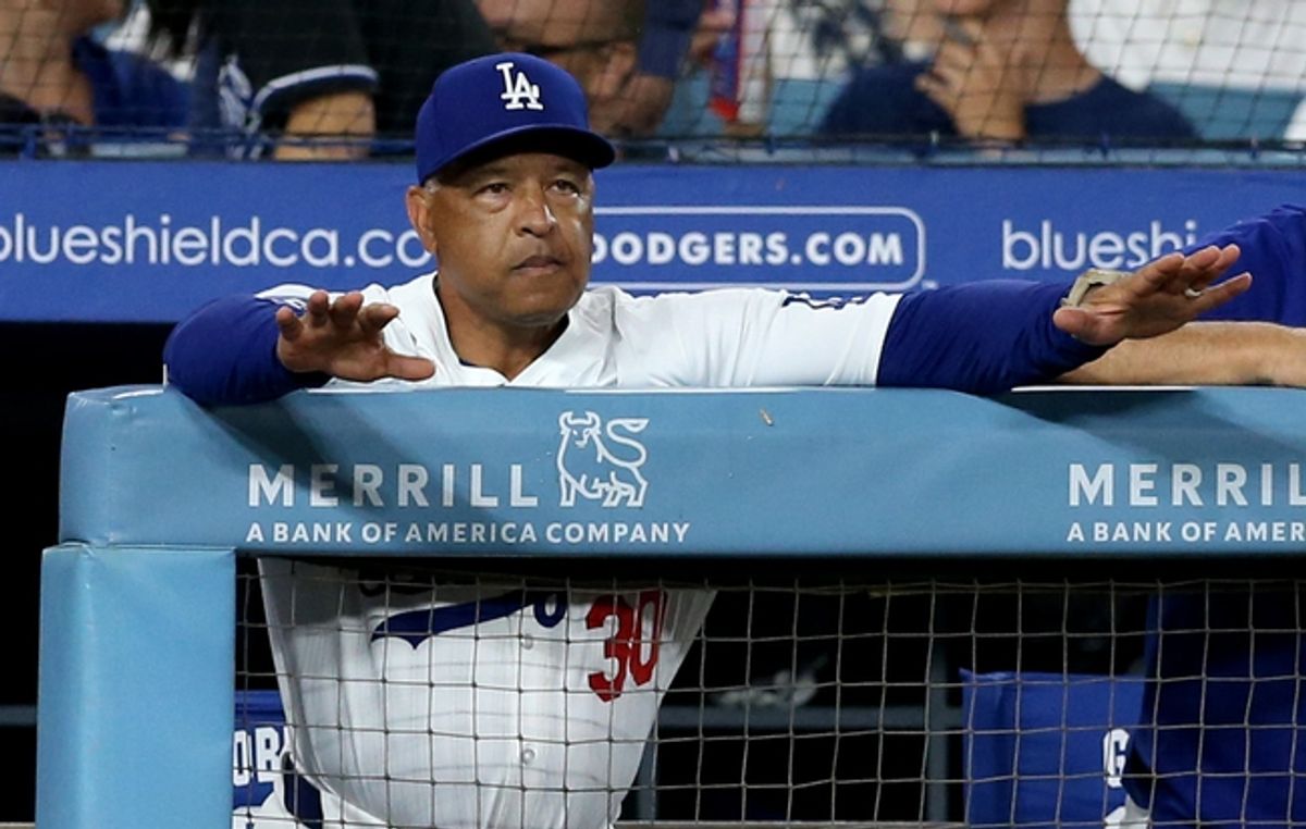 Jul 23, 2024; Los Angeles, California, USA; Los Angeles Dodgers manager Dave Roberts (30) during the fourth inning against the San Francisco Giants at Dodger Stadium. Mandatory Credit: Jason Parkhurst-USA TODAY Sports