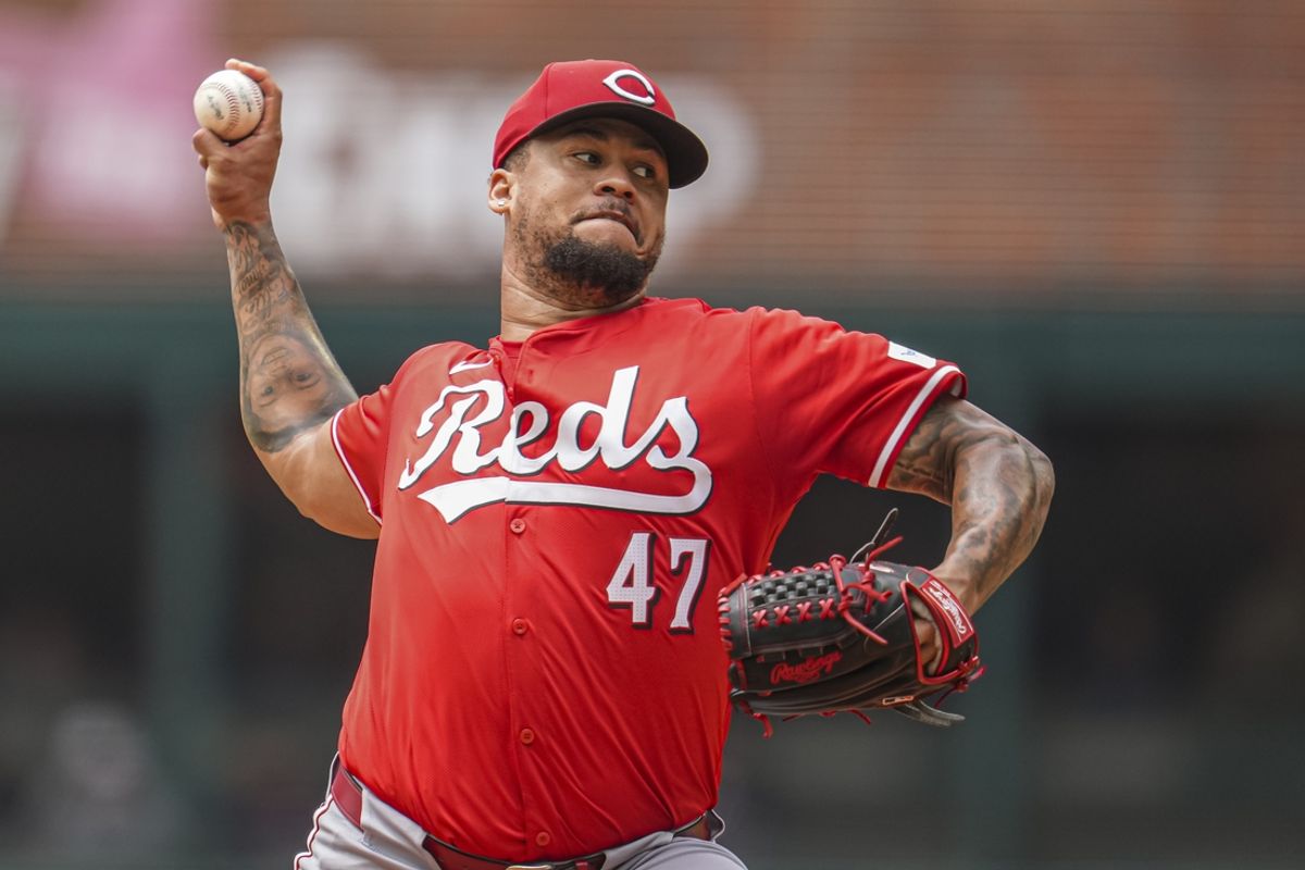 Jul 24, 2024; Cumberland, Georgia, USA; Cincinnati Reds starting pitcher Frankie Montas (47) pitches against the Atlanta Braves during the first inning at Truist Park. Mandatory Credit: Dale Zanine-USA TODAY Sports