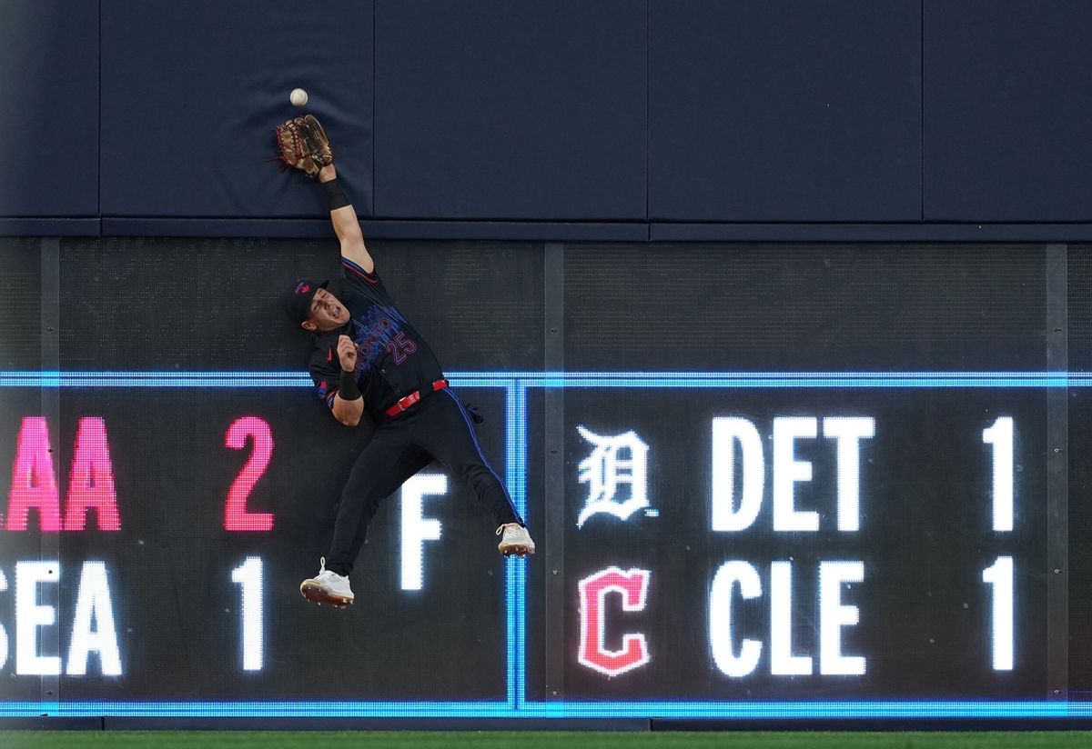 Jul 24, 2024; Toronto, Ontario, CAN; Toronto Blue Jays left fielder Daulton Varsho (25) catches a fly ball against the Tampa Bay Rays during the fifth inning at Rogers Centre. Mandatory Credit: Nick Turchiaro-USA TODAY Sports