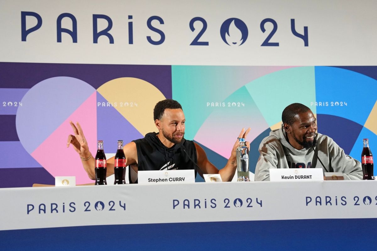 Jul 25, 2024; Paris, France; USA basketball players Stephen Curry and Kevin Durant talk to the media during a press conference. Mandatory Credit: Kirby Lee-USA TODAY Sports