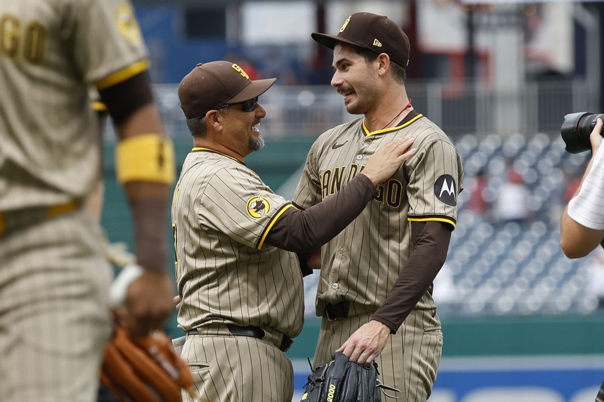 Jul 25, 2024; Washington, District of Columbia, USA; San Diego Padres starting pitcher Dylan Cease (84) celebrates with Padres pitching coach Ruben Niebla (57) after throwing a no-hitter against the Washington Nationals at Nationals Park. Mandatory Credit: Geoff Burke-USA TODAY Sports