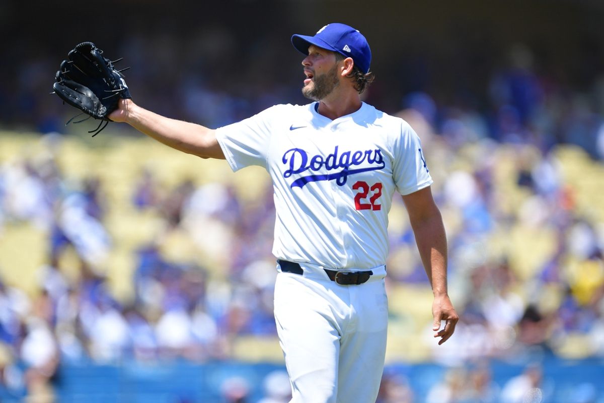 Jul 25, 2024; Los Angeles, California, USA; Los Angeles Dodgers starting pitcher Clayton Kershaw (22) against the San Francisco Giants during the first inning at Dodger Stadium. Mandatory Credit: Gary A. Vasquez-Imagn Images
