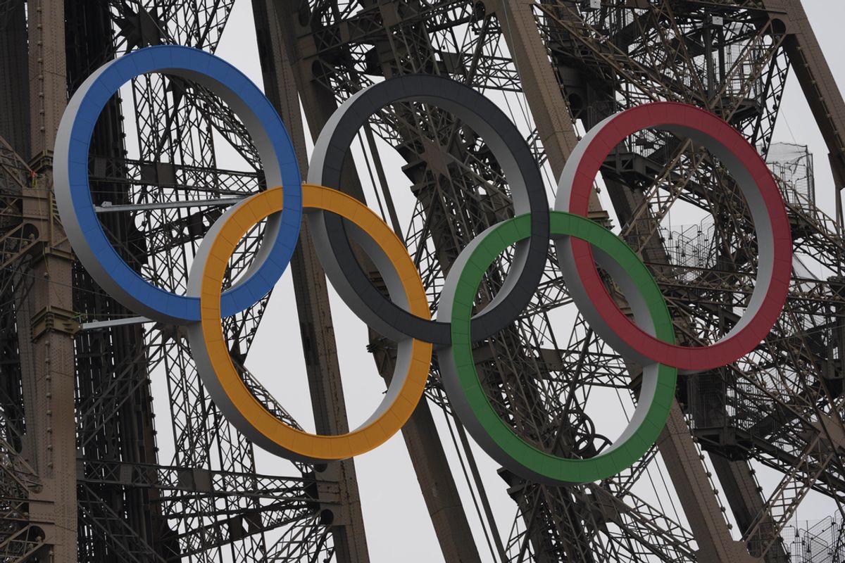 Jul 26, 2024; Paris, FRANCE; View of the Olympic rings on the Eiffel Tower before the Opening Ceremony for the Paris 2024 Olympic Summer Games along the Seine River. Mandatory Credit: Andrew P. Scott-USA TODAY Sports