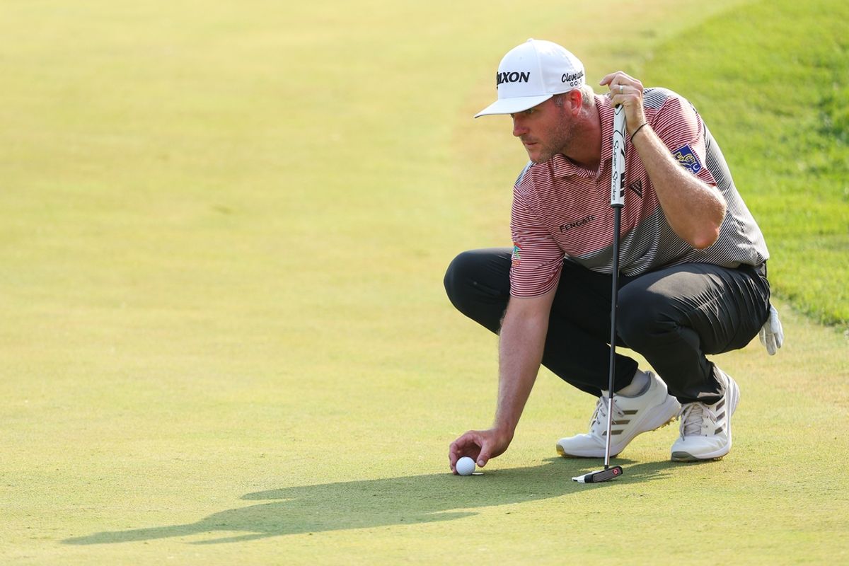 Jul 26, 2024; Blaine, Minnesota, USA; Taylor Pendrith lines up his putt on the eighteenth green during the second round of the 3M Open golf tournament. Mandatory Credit: Matt Krohn-USA TODAY Sports
