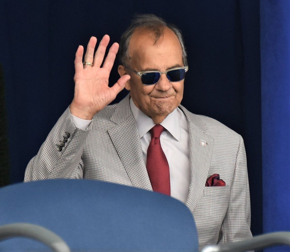 Joe Torre acknowledges the crowd during the introduction of returning inductees at the National Baseball Hall of Fame's 2024 induction ceremony Sunday, July 21, 2024, at the Clark Sports Center in Cooperstown, New York.