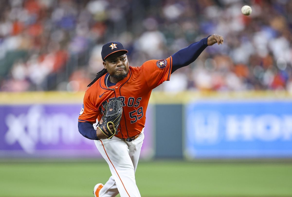 Jul 26, 2024; Houston, Texas, USA; Houston Astros starting pitcher Framber Valdez (59) delivers a pitch during the third inning against the Los Angeles Dodgers at Minute Maid Park. Mandatory Credit: Troy Taormina-USA TODAY Sports