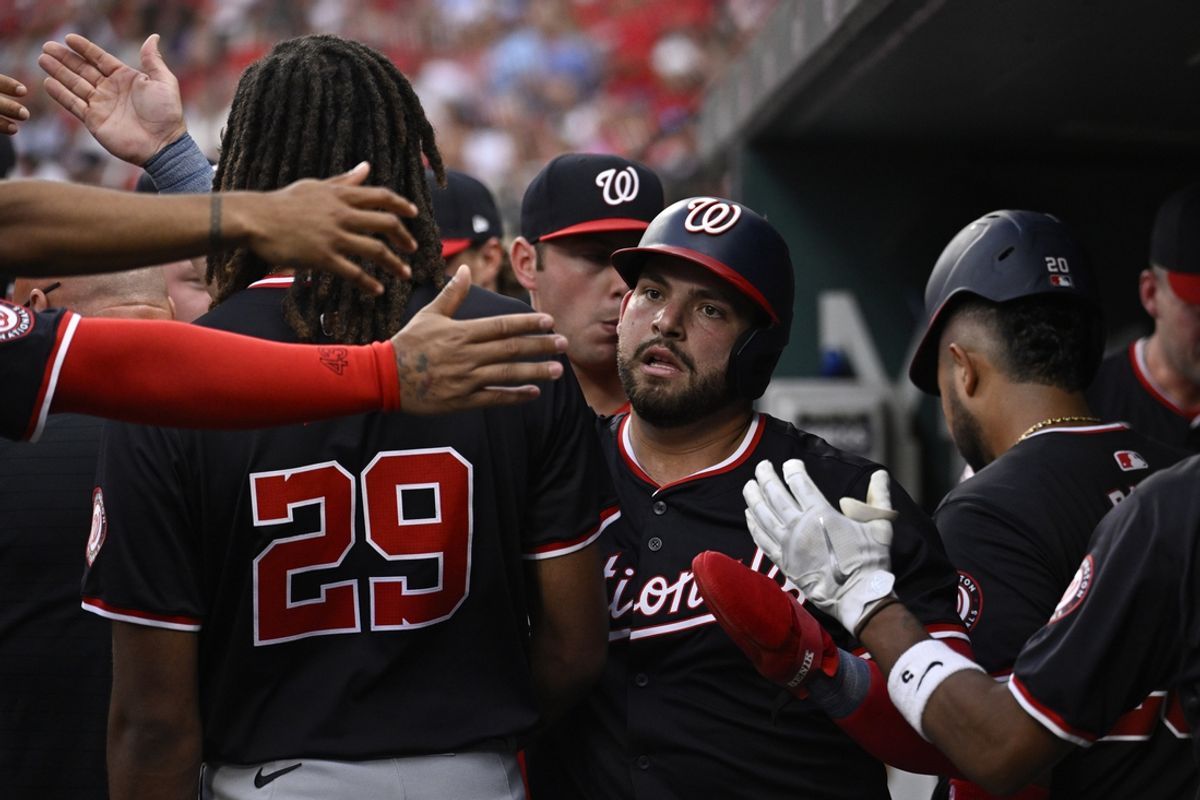 Jul 26, 2024; St. Louis, Missouri, USA; Washington Nationals first baseman Juan Yepez (18) celebrates with teammates after scoring off a double from Washington Nationals second baseman Luis Garcia Jr. (not pictured) against the St. Louis Cardinals during the second inning at Busch Stadium. Mandatory Credit: Jeff Le-USA TODAY Sports