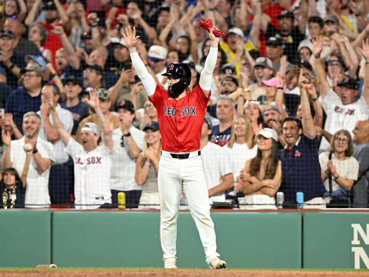 Jul 26, 2024; Boston, Massachusetts, USA; Boston Red Sox catcher Connor Wong (12) reacts after scoring a run on a two-run RBI single hit by outfielder Masataka Yoshida (not seen) against the New York Yankees during the eighth inning at Fenway Park. Mandatory Credit: Brian Fluharty-USA TODAY Sports
