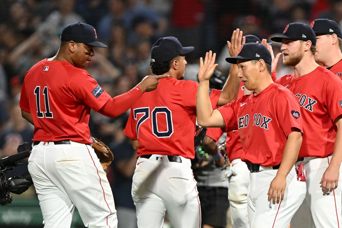 Jul 26, 2024; Boston, Massachusetts, USA; Boston Red Sox third baseman Rafael Devers (11) points to outfielder Masataka Yoshida (7) after a game against the New York Yankees  at Fenway Park. Mandatory Credit: Brian Fluharty-USA TODAY Sports