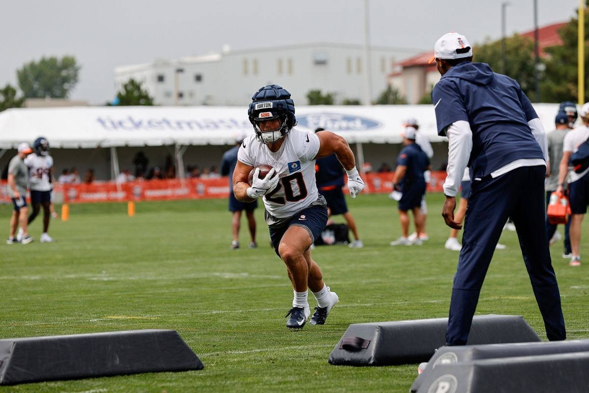 Jul 26, 2024; Englewood, CO, USA; Denver Broncos fullback Michael Burton (20) during training camp at Broncos Park Powered by CommonSpirit. Mandatory Credit: Isaiah J. Downing-Imagn Images