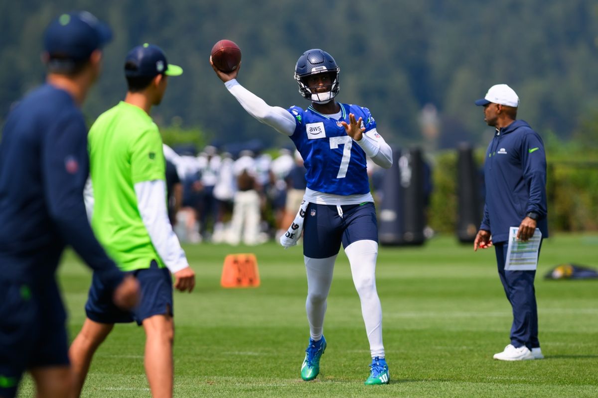 Jul 27, 2024; Renton, WA, USA; Seattle Seahawks quarterback Geno Smith (7) passes the ball during training camp at Virginia Mason Athletic Center. Mandatory Credit: Steven Bisig-USA TODAY Sports