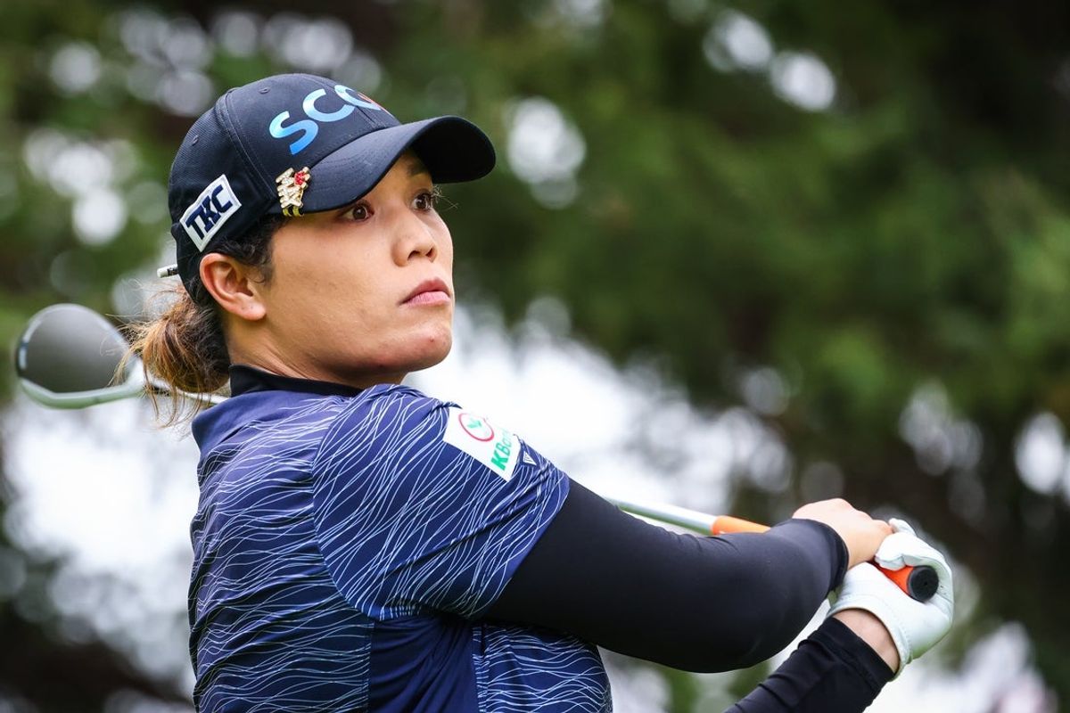 Jul 27, 2024; Calgary, Alberta, CAN; Hye-Jin Choi plays her shot from the second tee during the third round of the CPKC Women's Open golf tournament. Mandatory Credit: Sergei Belski-Imagn Images