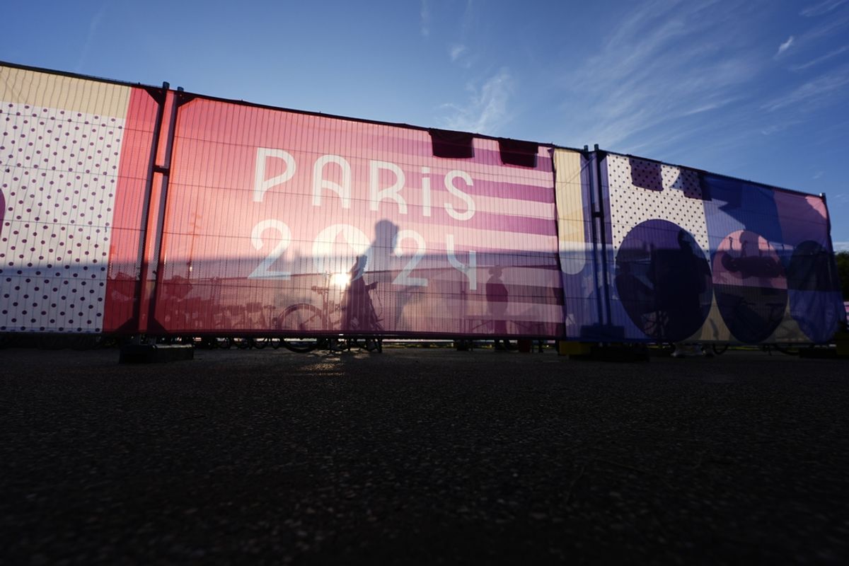 Jul 28, 2024; Vaires-sur-Marne, France;  A general view of logos on a wind screen at the rowing competition during the Paris 2024 Olympic Summer Games at Vaires-sur-Marne Nautical Stadium. Mandatory Credit: Sarah Phipps-USA TODAY Sports