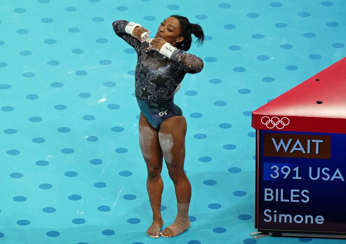 Simone Biles of the United States after performing on the uneven bars in womenís qualification during the Paris 2024 Olympic Summer Games at Bercy Arena. Mandatory Credit: James Lang-USA TODAY Sports